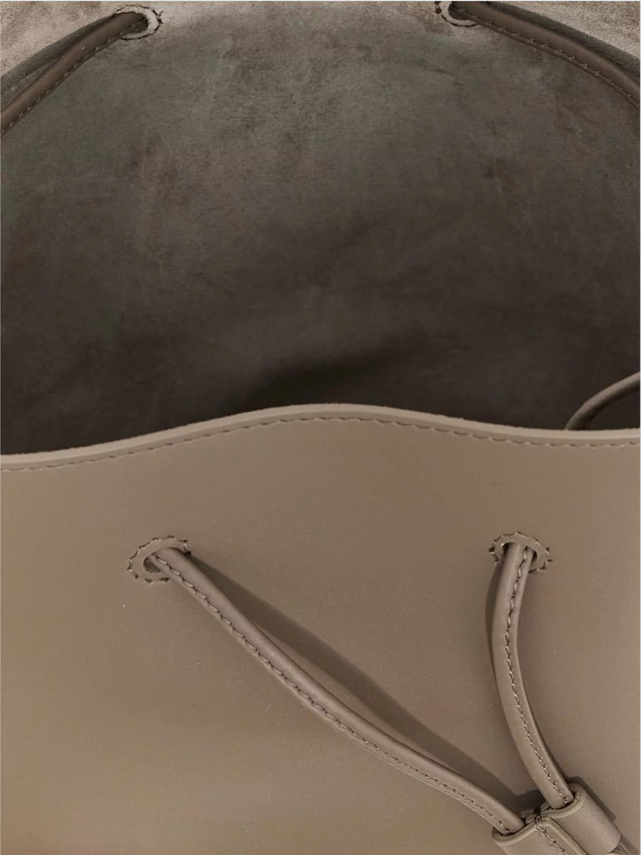 Brunello Cucinelli   Bucket bag with adjustable strap and smooth finish