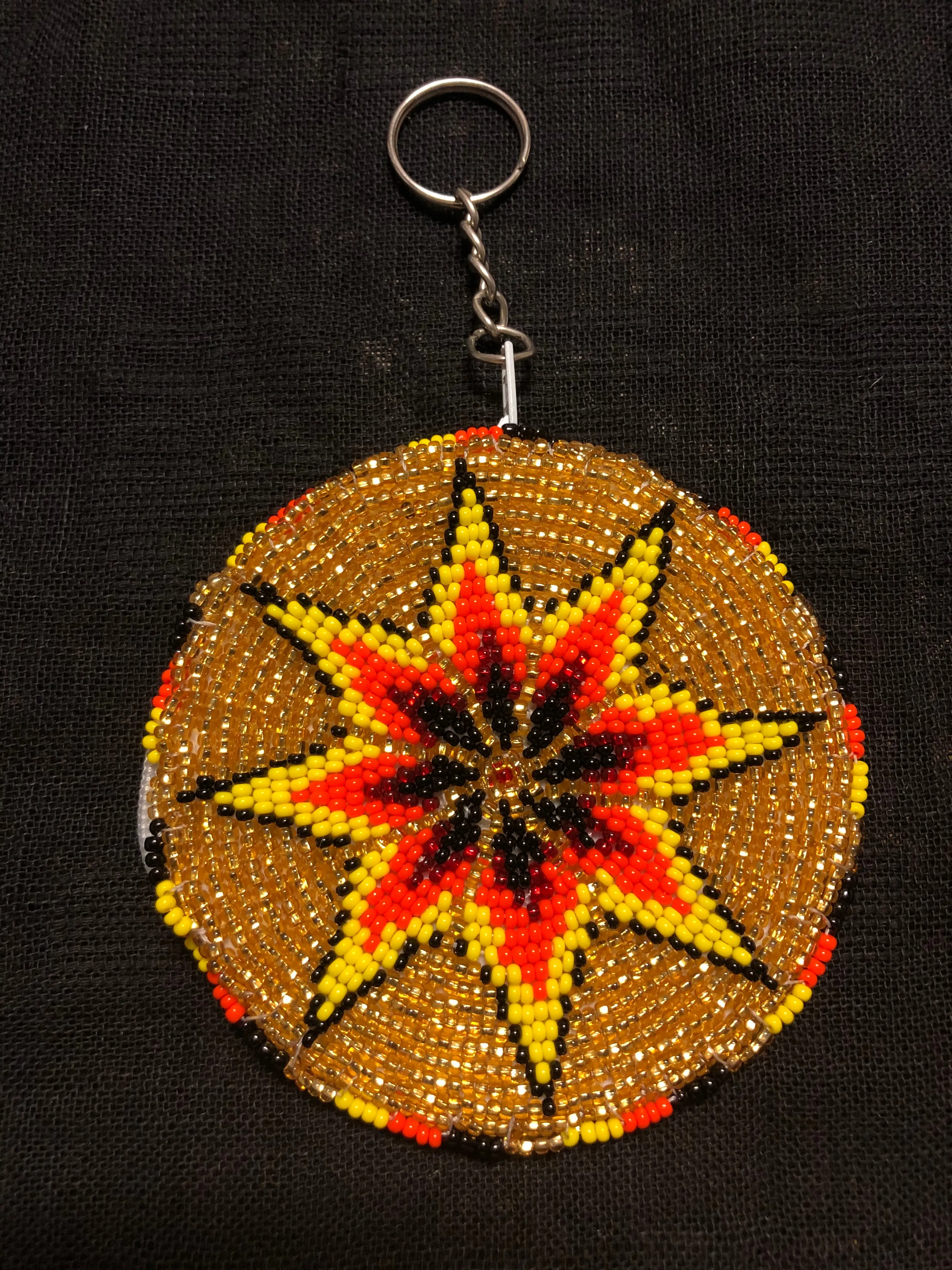 Guatemalan handcrafted glass bead round change purse with key ring. 3.5” diameter.