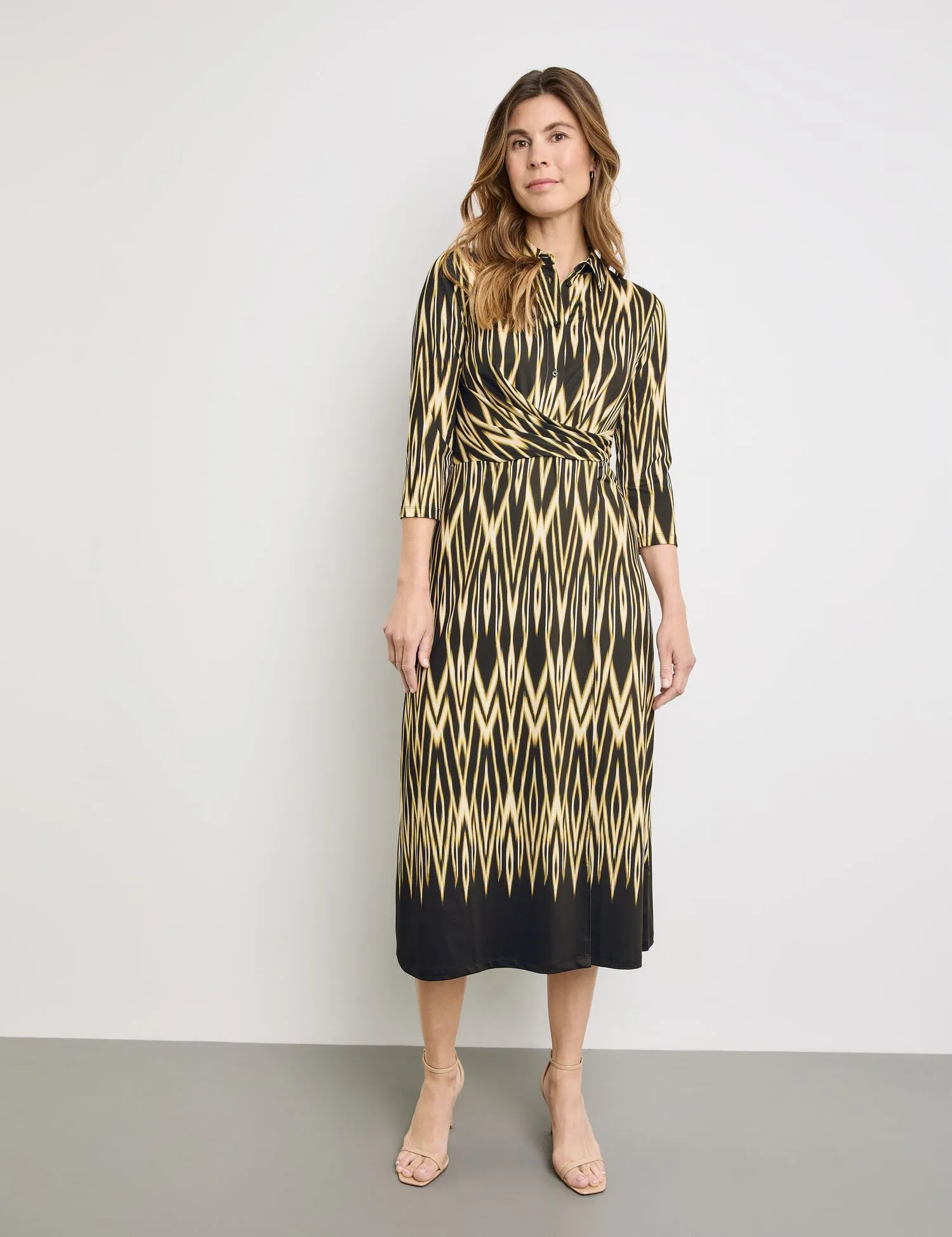 Maxi dress with wrap-over effect