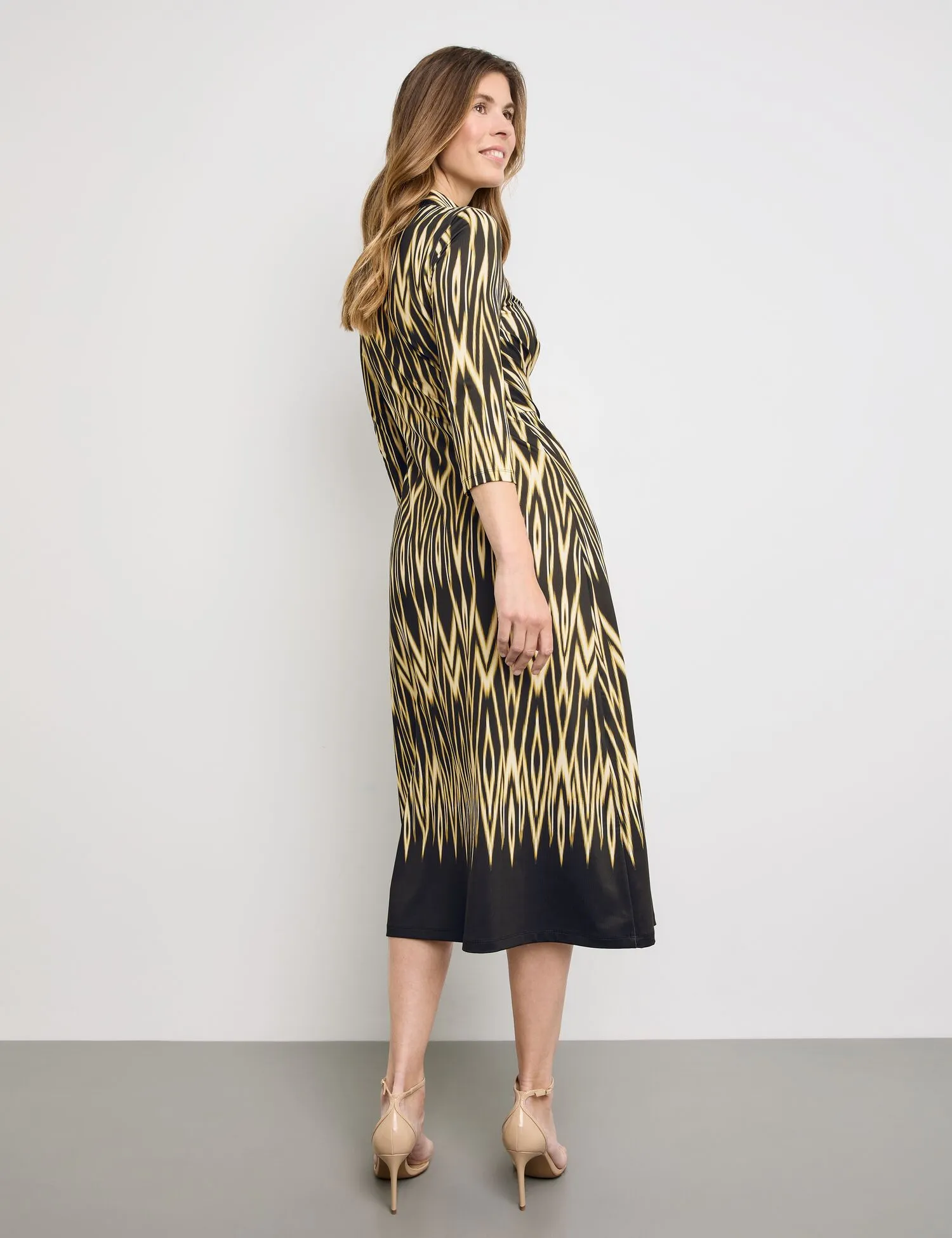 Maxi dress with wrap-over effect